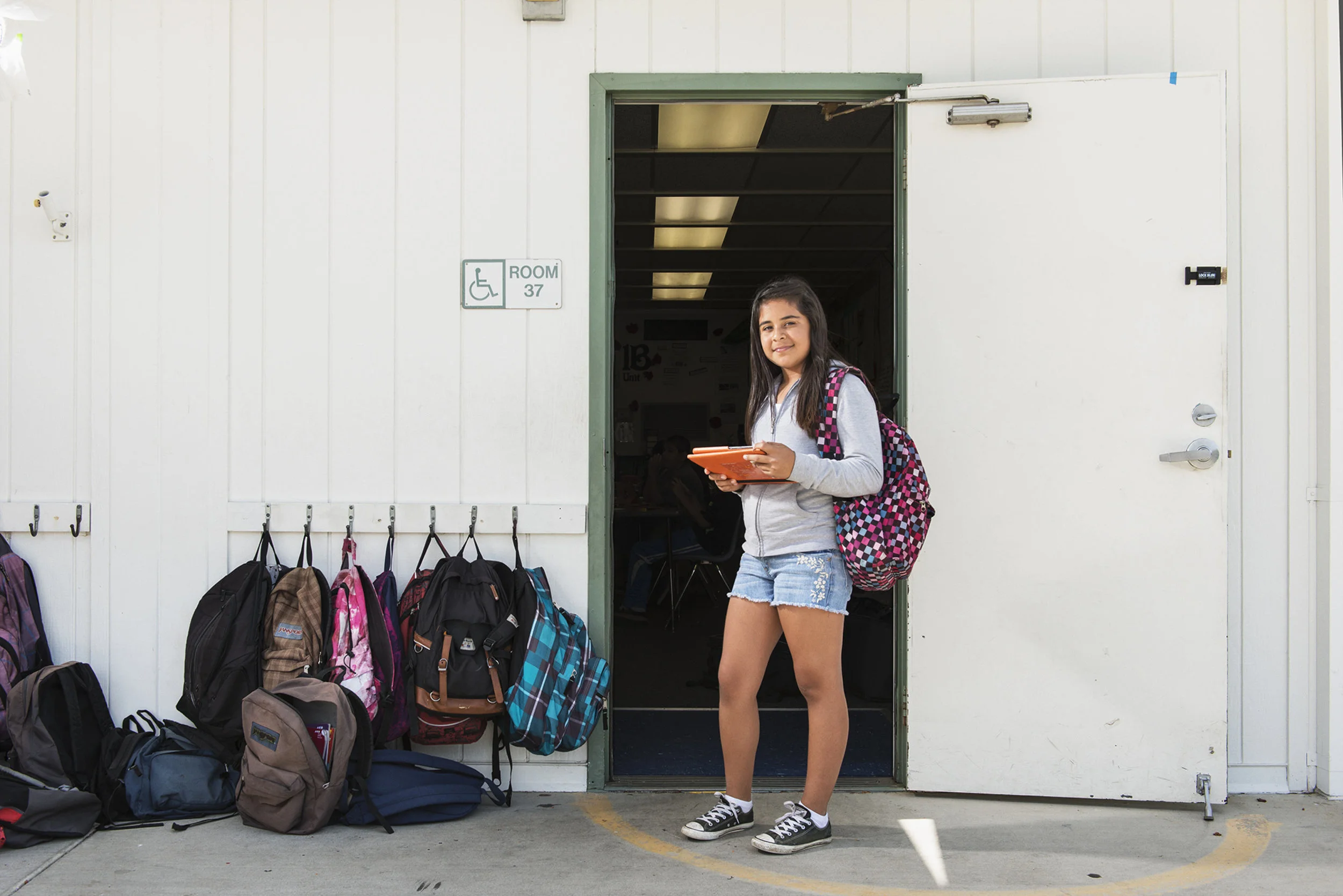 Schools all over the country have invested into iPad's and tablets for students to use and take home, but about 30% of American school children don't have internet access at home and about 50% of the students at Alvin Dunn Middle school in San Marcos don't have internet. The San Diego based Qualcomm Wireless is attempting to close this "homework gap" with their free data plan program for kids to be able to do homework at home with their tablets. Shot for WIRED Magazine.