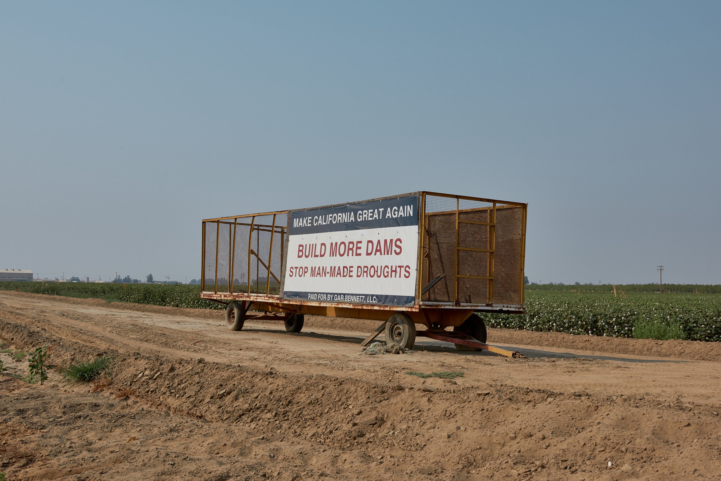 Signs about the drought are seen along highways in the Central Valley