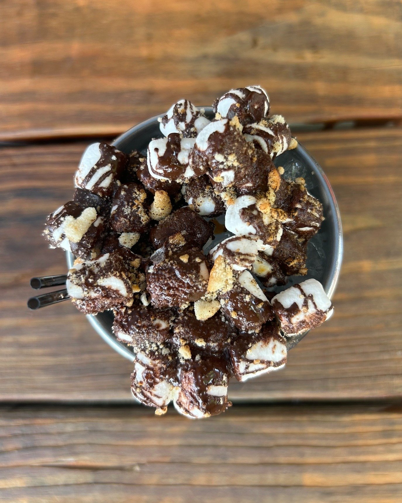 Remember summer campfires? This is like that (if your camp counselors knew how to pour a mean cocktail). The Campfire is everything you want in a s&rsquo;mores-inspired sip - Angels Envy, Dewars, vanilla, and cream topped with br&ucirc;l&eacute;ed ma
