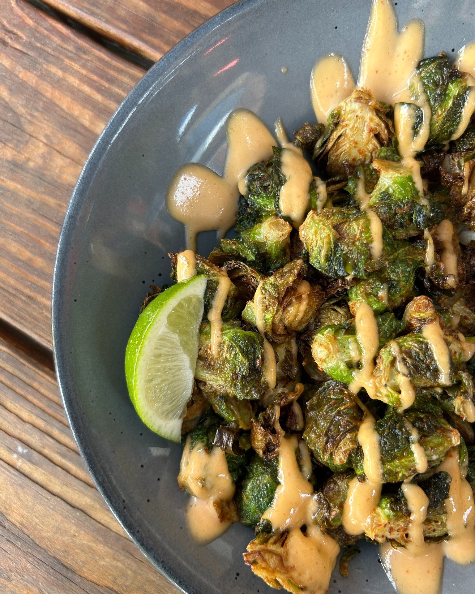Brussels sprout dreams 𝘥𝘰 come true, and they&rsquo;re fried, tossed in Taj&iacute;n, hit with lime, and covered in chili aioli 🌶️🔥 Who knew your least favorite vegetable as a kid would end up being your favorite bar snack? 

We are hosting trivi