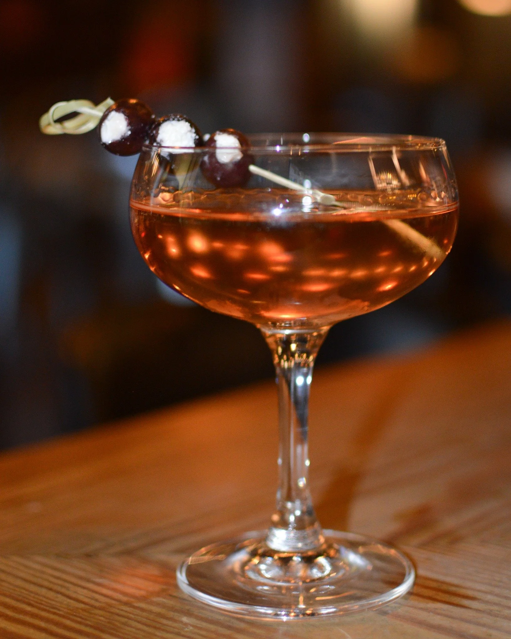 Meet our Siren Song. 👋

Miles gin, Cocchi Americano, capers, dry vermouth, thyme, and a kalamata &amp; feta garnish come together to make a cocktail that's as tempting as it looks. Consider yourself warned!