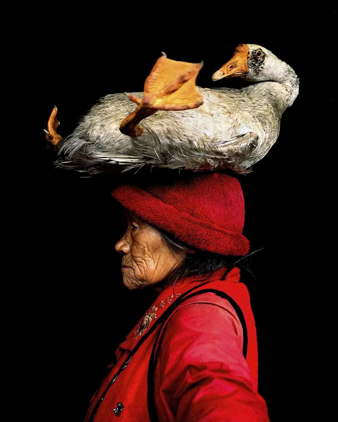 Lady with the Goose, Photo by Cristina Mittermeier (Yunnan Province, China)