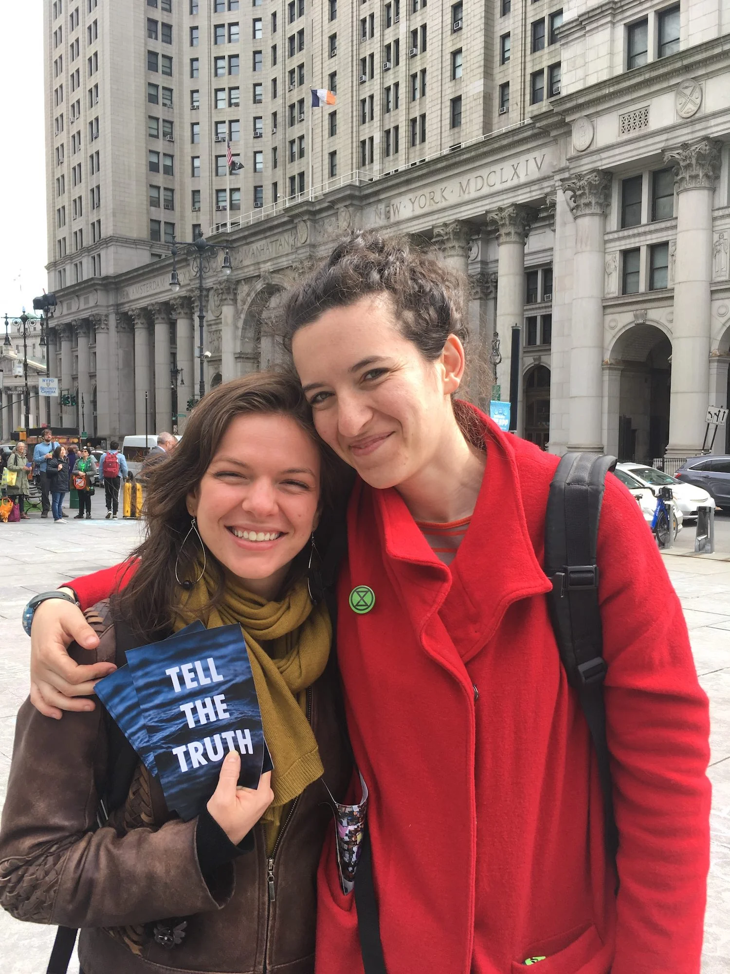 Liz Moyer and Zettie Shapey (l–r), in front of the David N. Dinkins Manhattan Municipal Building facing City Hall