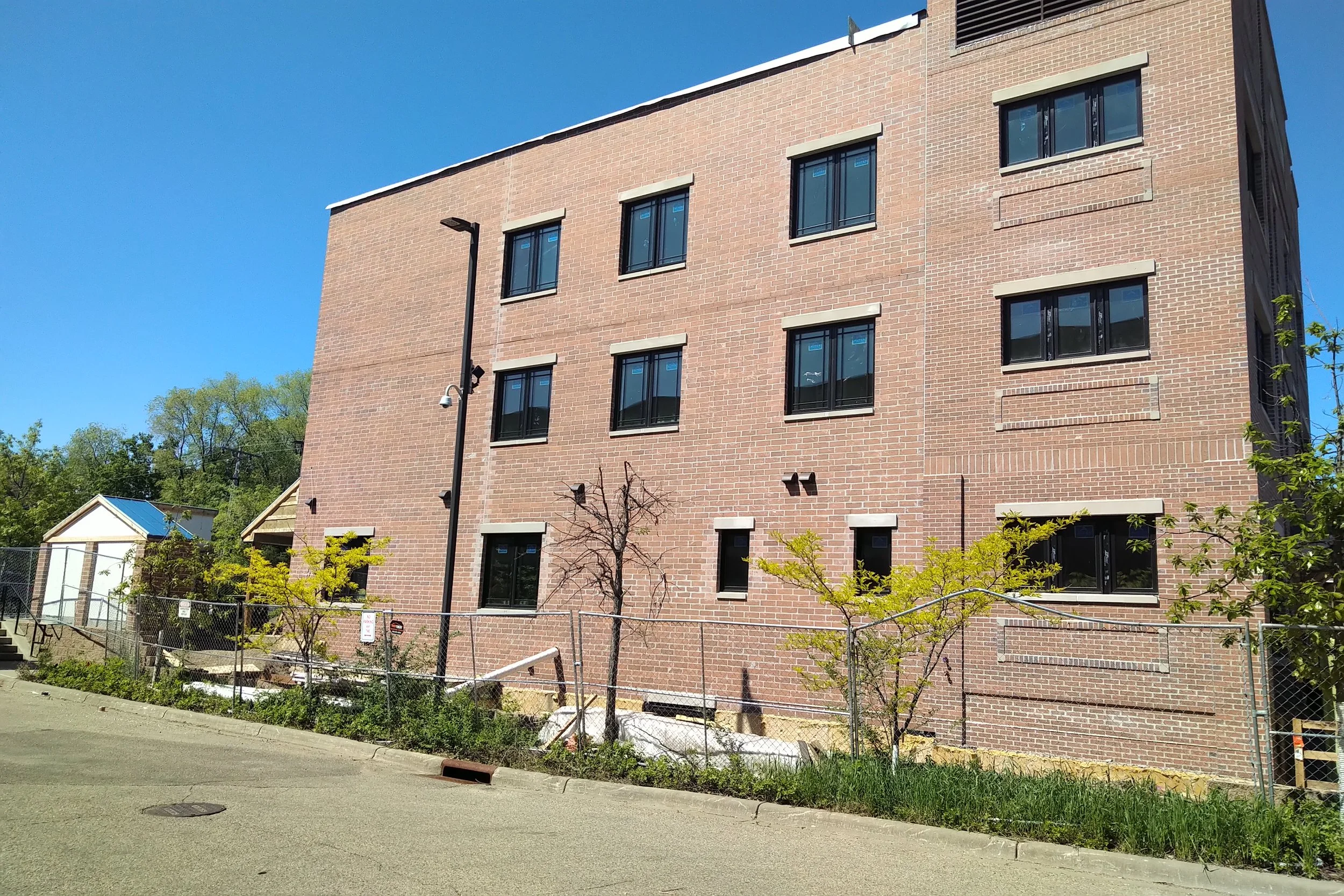 How Eco‐Friendly and Sustainable Wall Finishes Elevate Modern Design - Sustainable Apartment Complex With Textured Finish