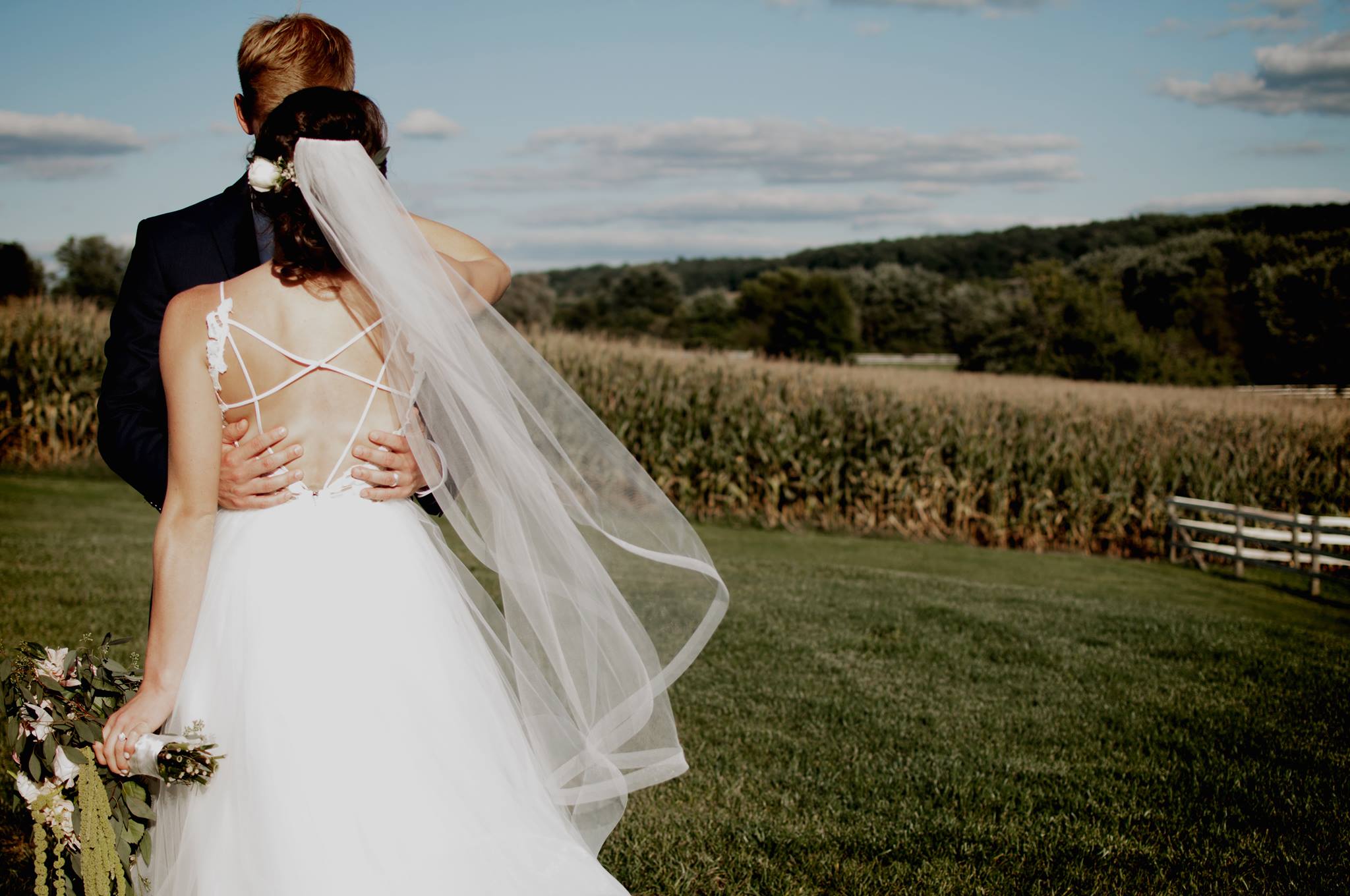 eric and missy kissing cornfield.jpg