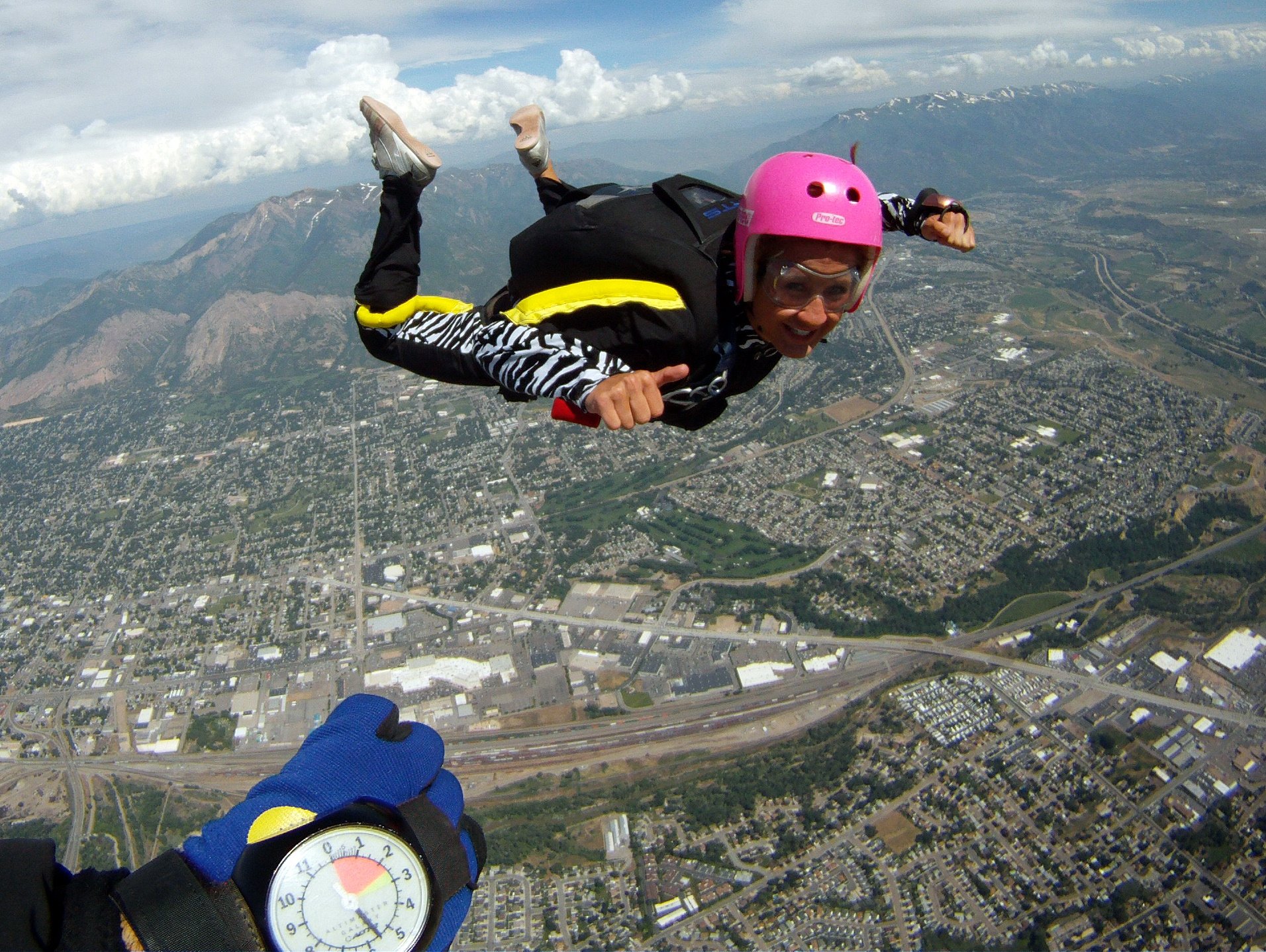 During my undergraduate schooling, I worked at an Indoor Skydiving Facility (iFly Utah) and even got certified to skydive on my own in the Sky! The feeling of being up above the mountains was unreal!