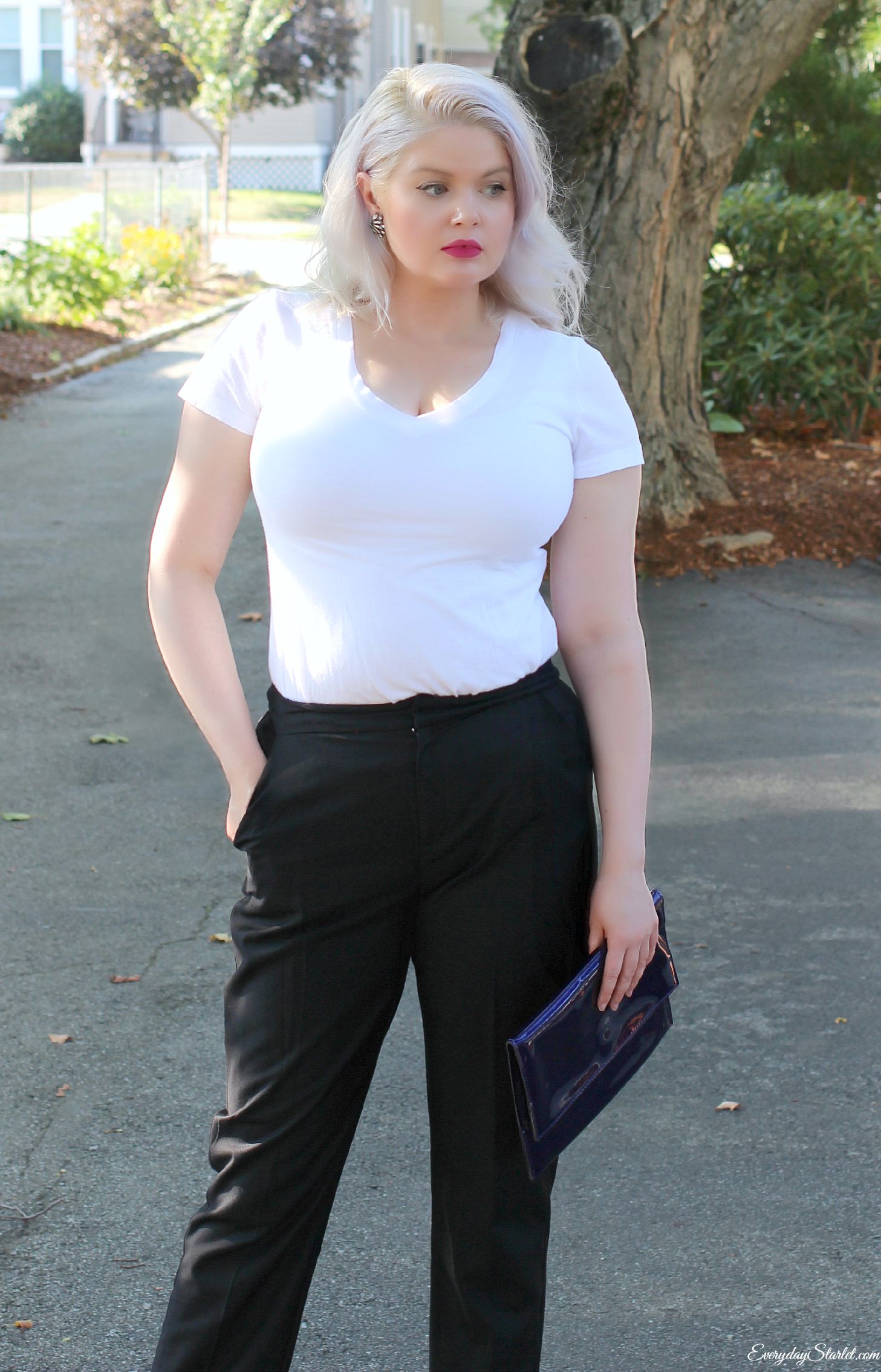 WERK!!!! Who says curves aren't sexy? There is so much yes in this photo. Girls with a more ample bust should not shy away from white or from a more fitted shirt. I like the confidence this woman exudes and I like the different take on a classic menswear look.