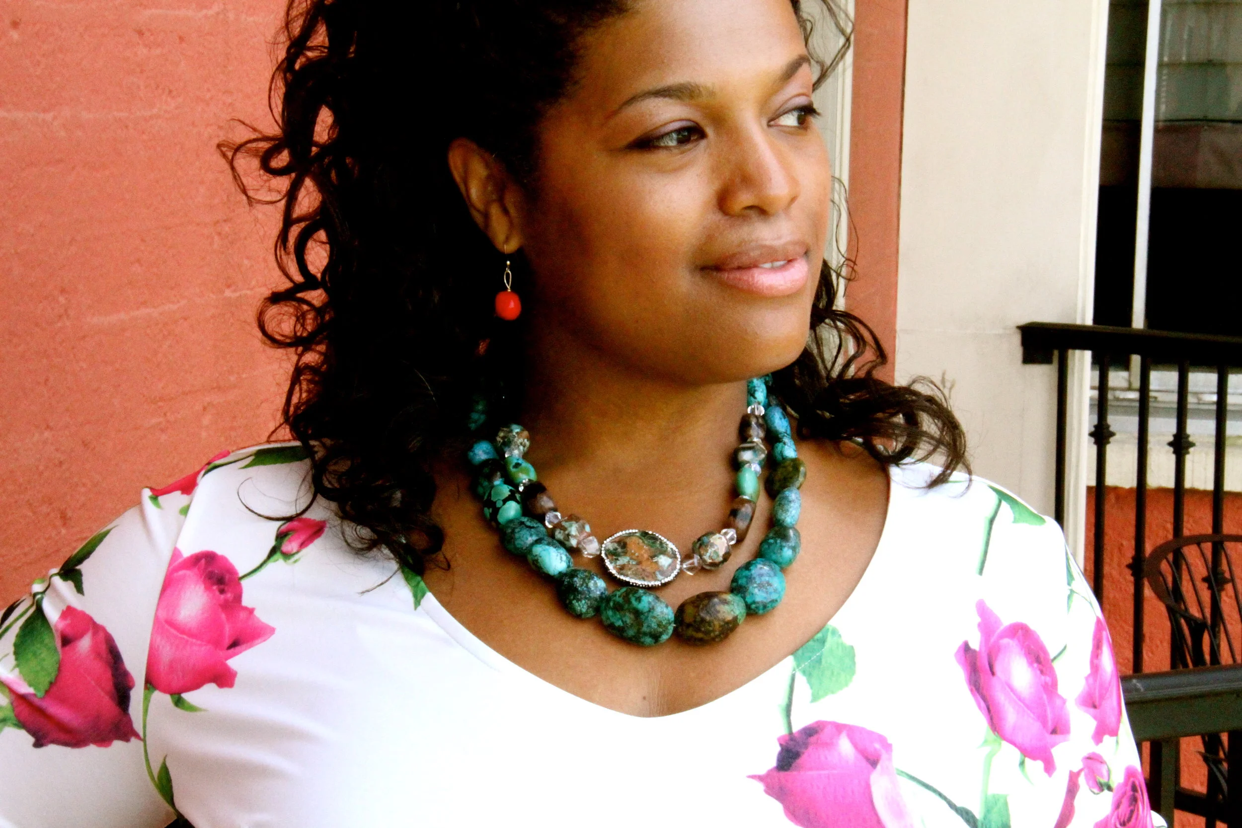 For a fun spring shower or garden party, pair a feminine floral dress with delicate colorful earrings and two interesting strands of turquoise stones . Don't be afraid to go bold on the outfit and bolder on the accessories. Your personality will pull it all together!