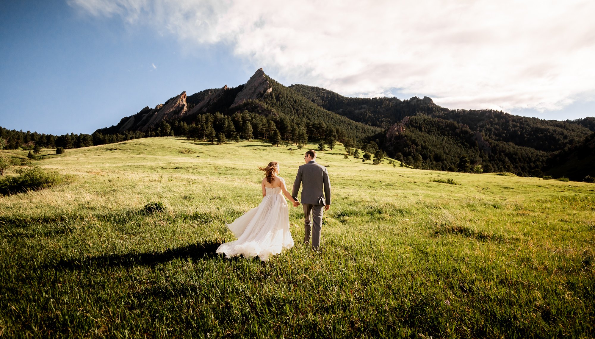 Couple on their wedding day at the flat irons in boulder colorado