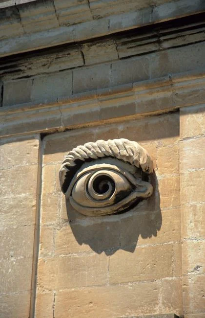 Eye symbol on sentry box, Gardjola Gardens, Senglea, Malta. Artist: Matty Lawrence Eye symbol on sentry box, Gardjola Gardens, Senglea, Malta. The Gardjola (sentry box), overlooking the harbour was built in the 16th century by the Knights of St John. Sculpted in high relief are symbols of unceasing vigilance: the eye, the ear, and the crane bird. The inscription in Latin assures the inhabitants of the harbour area to rest at ease, as the tower stands guard against any hostile force that may attempt to approach Maltese shores. Photo Credit: HIP / Art Resource, NY Image Reference: AR954267