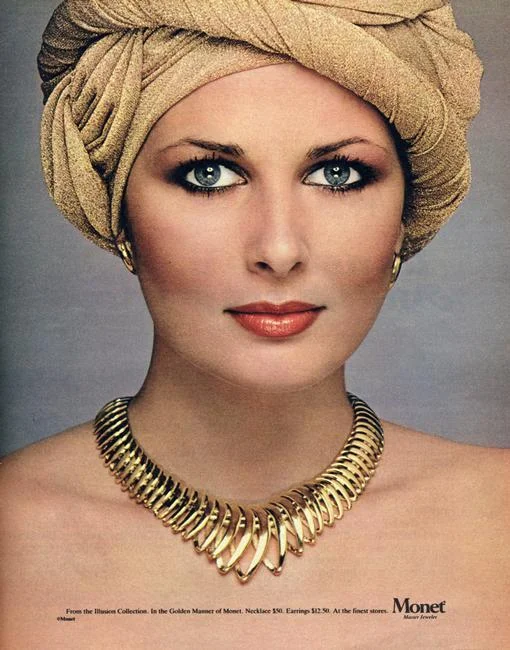 Advertisement from the Illusion Collection by Monet, 1970s. In the Golden Manner of Monet. Necklace $50; earrings $12.50. Monet is a jewellery brand of the American fashion house Liz Claiborne. Rights information: Cleared for Editorial Use Only. Please Contact Us For Any Other Clearance Rights Photo Credit: HIP / Art Resource, NY Image Reference: AR998038
