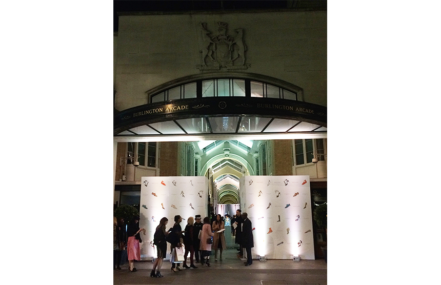 Attendees arriving at the opening of the new boutique in Burlington Arcade