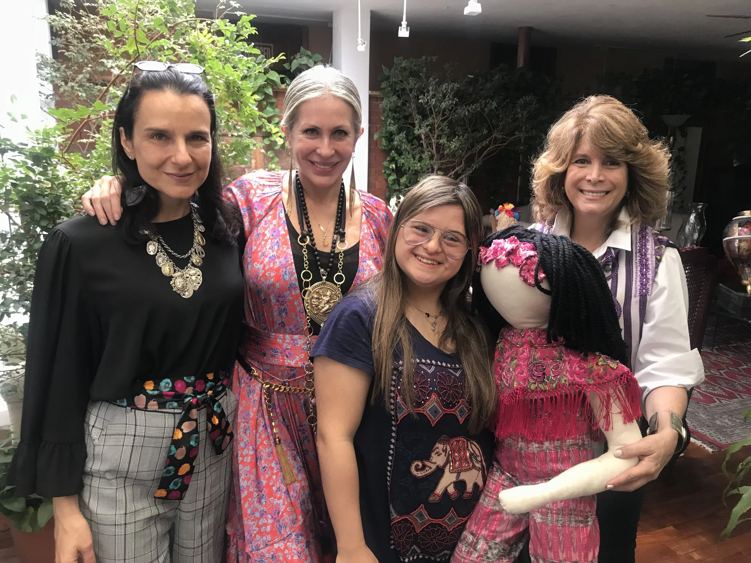 PACUNAM President Marianne Hernandez, Carmen, Bel and Isabella.