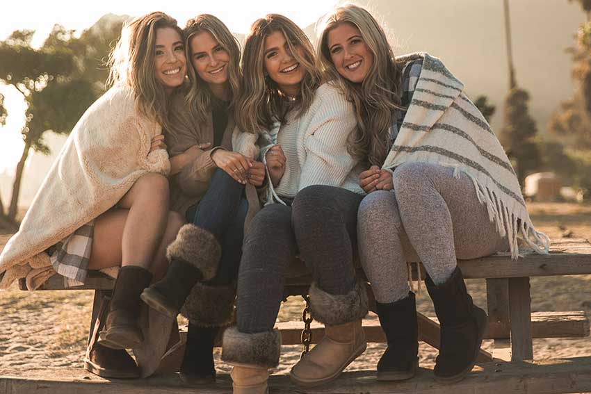 4 girls wearing vegan UGGS PAWJ