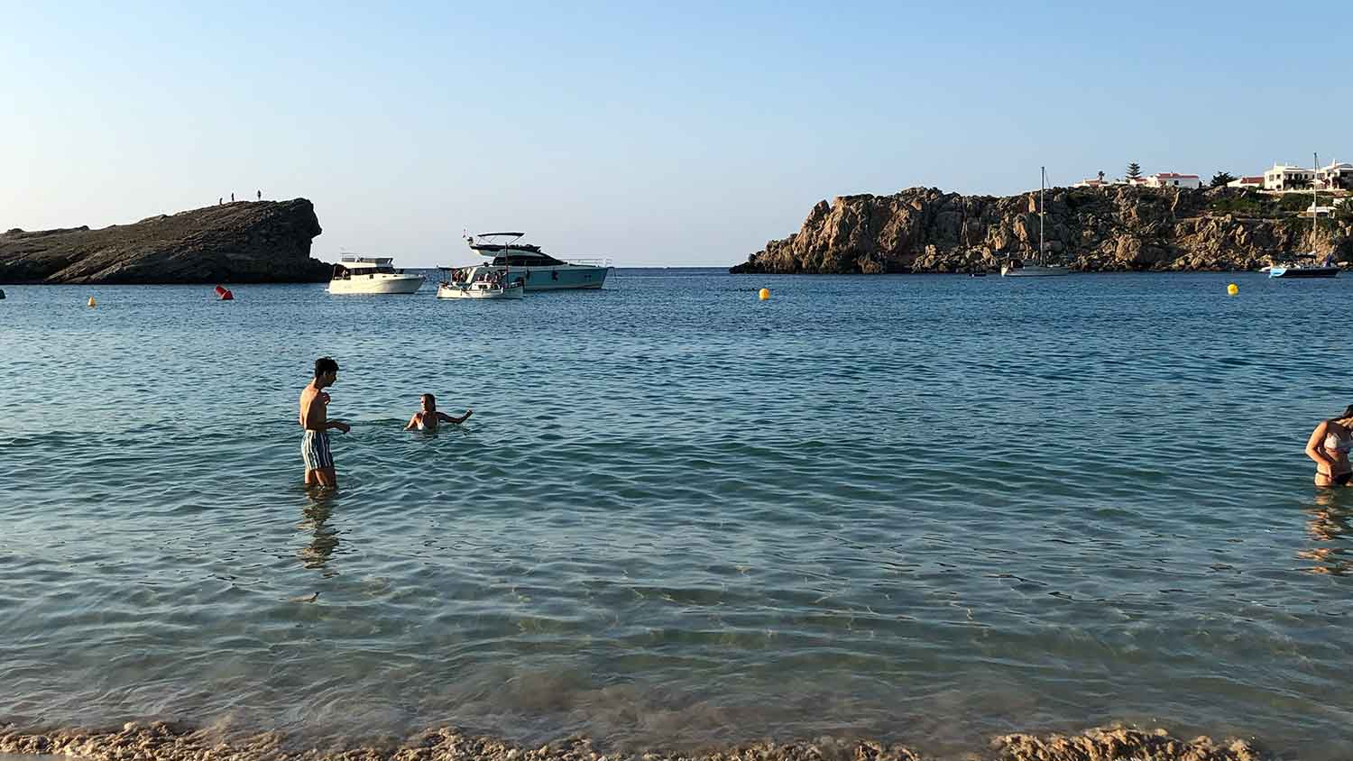best beach Menorca Arenal D’en Castell people playing sea