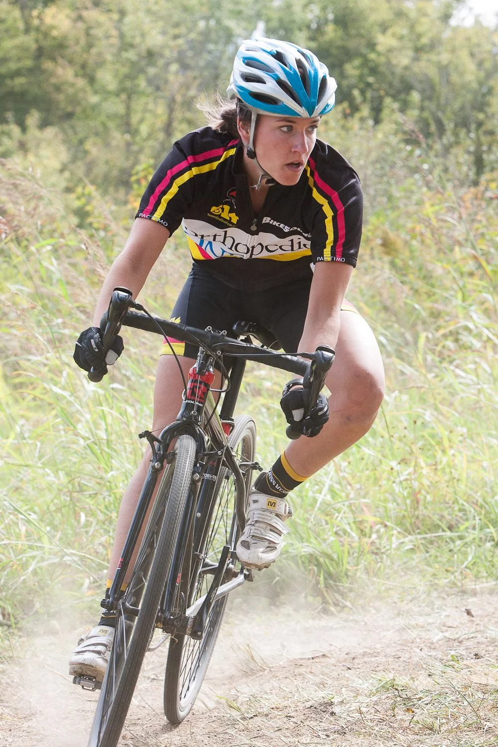 My first year racing I was encouraged to compete in Cap City Cross first and then head out to OVCX - Gun Club, which also happened to be my first W123 race. (Note: Pretty much every item I am wearing in this photo except for my helmet was loaned to me by other cyclists - the Columbus cycling family is one of the most generous groups of people I have ever met).