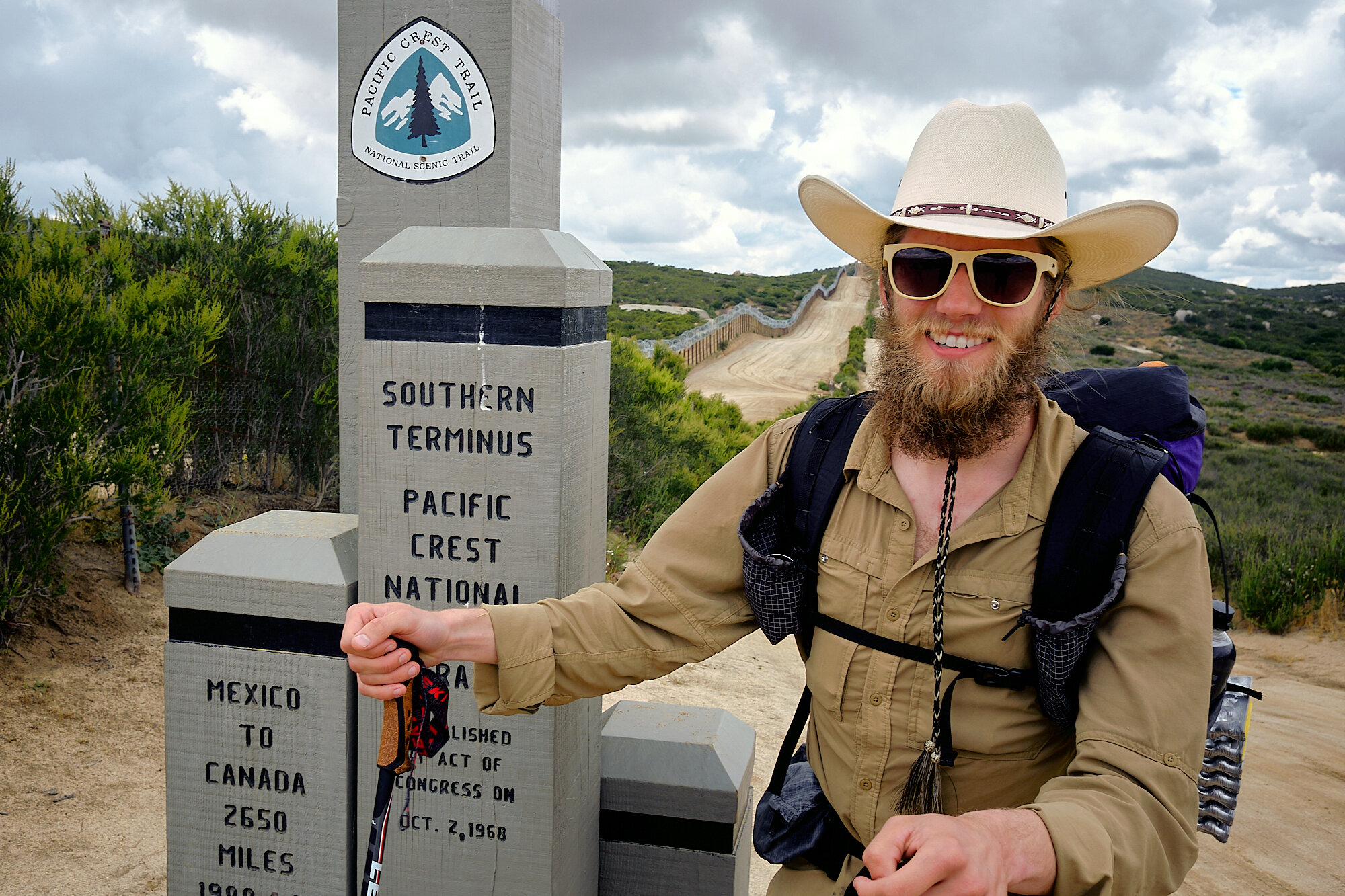  At the southern terminus on the U.S/Mexico border. The wall is visible in the background. | 5/6/19 Mile 0.0, 2,918' 