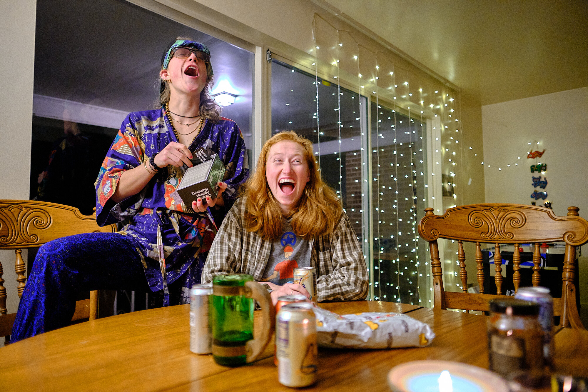  Two of our roommates, Julie and Heidi amused by a Cards Against Humanity answer. | Holladay, UT 1/8/20 