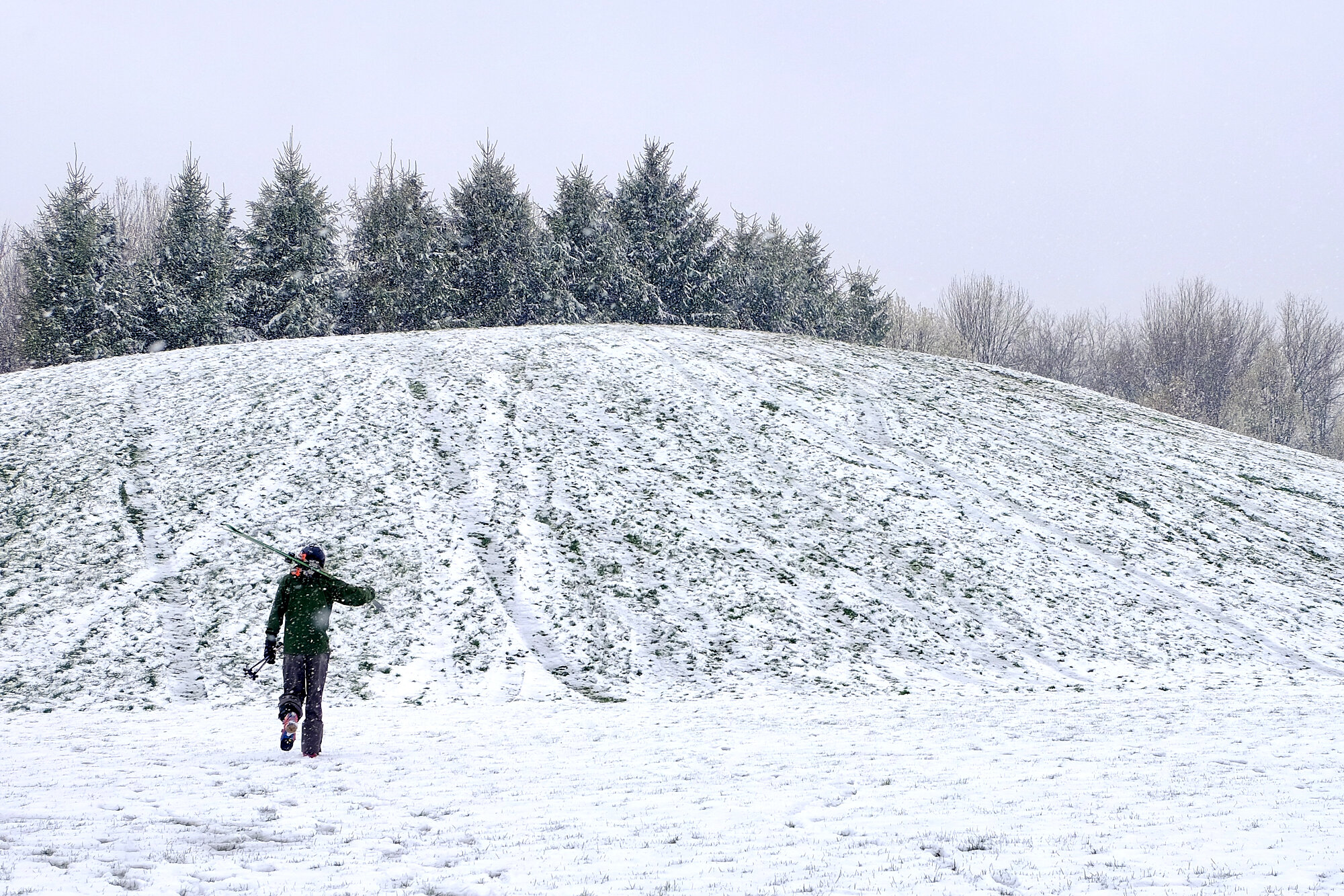  A late season flurry dropped some snow on the old rec center sledding hill. It only stuck for a couple of hours, but I still managed to get some turns in! I can reasonably confidently say I am the only person to have telemark skied this face. (Photo