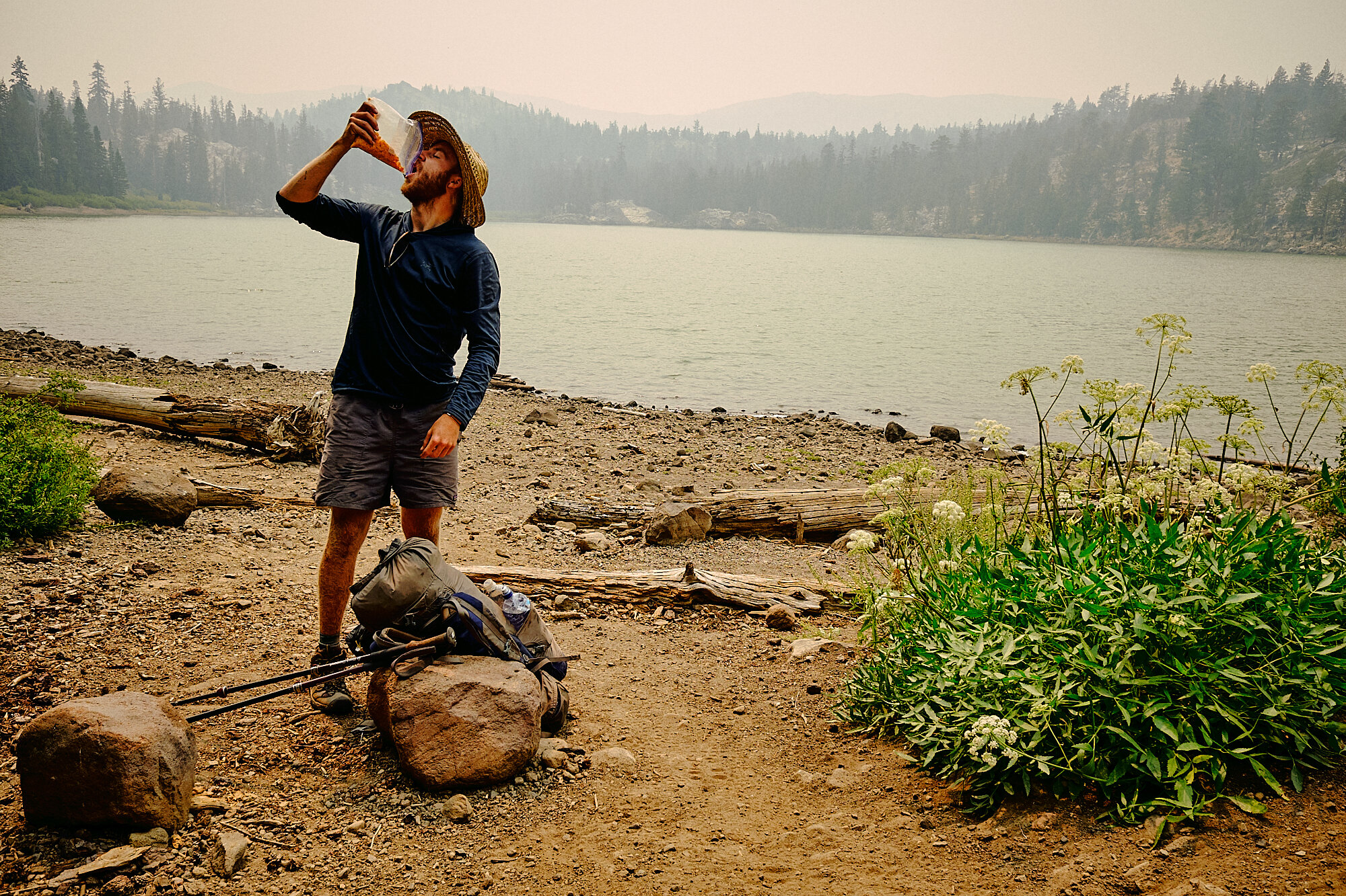  Lebowski grabs a quick snack on the shore of Round Lake before parting ways. The smoke had been building for days and made for quite difficult breathing. | 8/19/20 Big Meadow, CA 