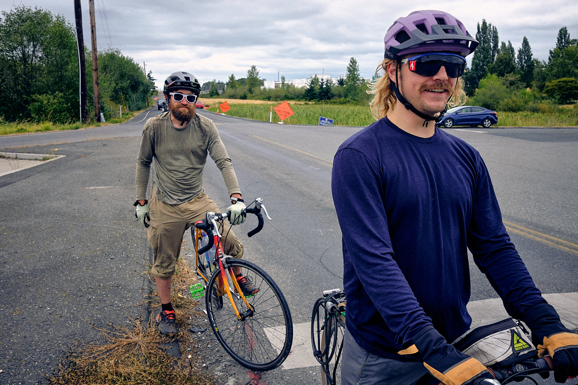  Skeeter and Lucas apprehensively  wait to turn on to Highway 20, the most highly trafficked portion of our bike route alternate. The PNT primary walks mostly roads for 80 miles from Bellingham to the Coupeville ferry, which sounded awful. So we just