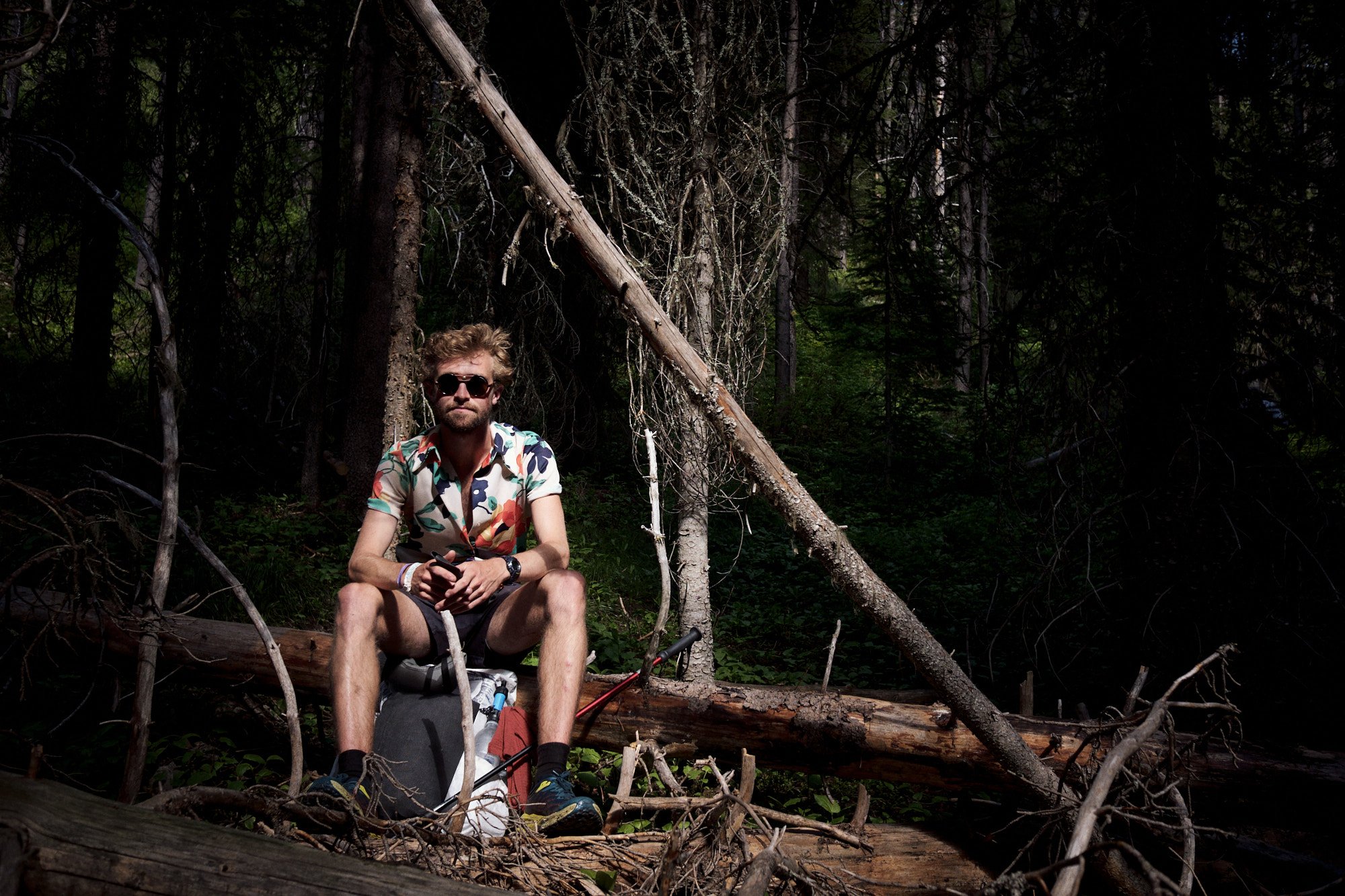 Dig stops for a sit in one of the few pools of light that broke through the dense forest. | Bob Marshall Wilderness, MT 6/30/22 Day 9