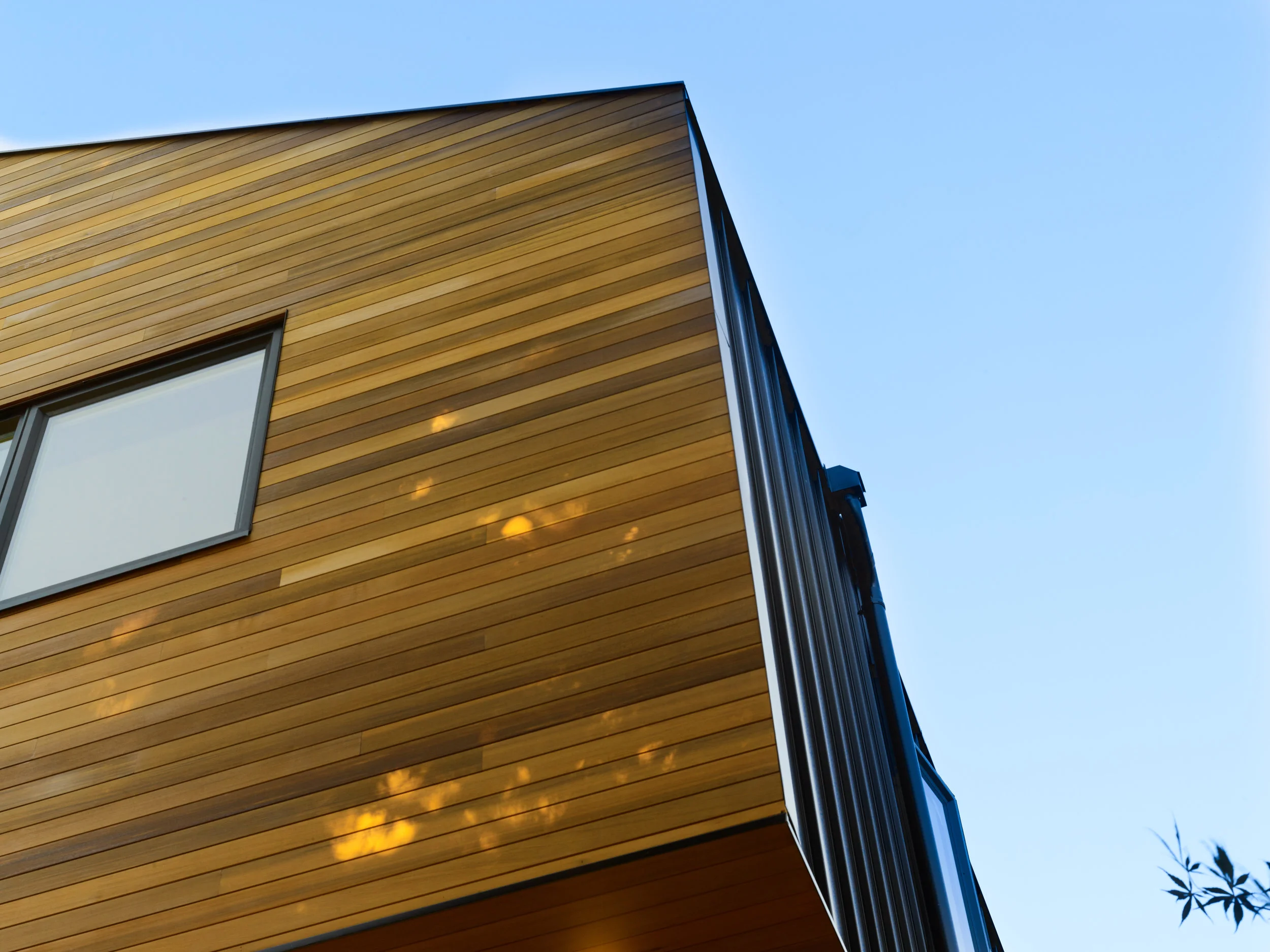 A hidden gutter system enhances the illusion that our siding runs unobstructed into the roofline.