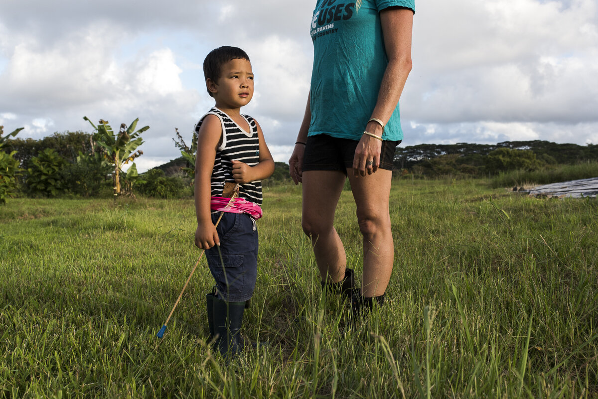  Emily Taaroa and her son, Tehau, on their 25 acre diversified farm in Hawai’i Island’s Puna District. Along with her husband, Yoric, Emily started the farm, called Punachicks, to fill a gap in the market for locally grown pasture-raised chickens. Th