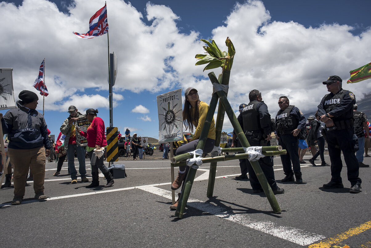  Hundreds of activists gathered by Mauna Kea Access Road during the summer of 2019 in response to the construction of a massive telescope that many Native Hawaiians consider sacred. The kia’i, meaning protectors in the Hawaiian language, remained by 