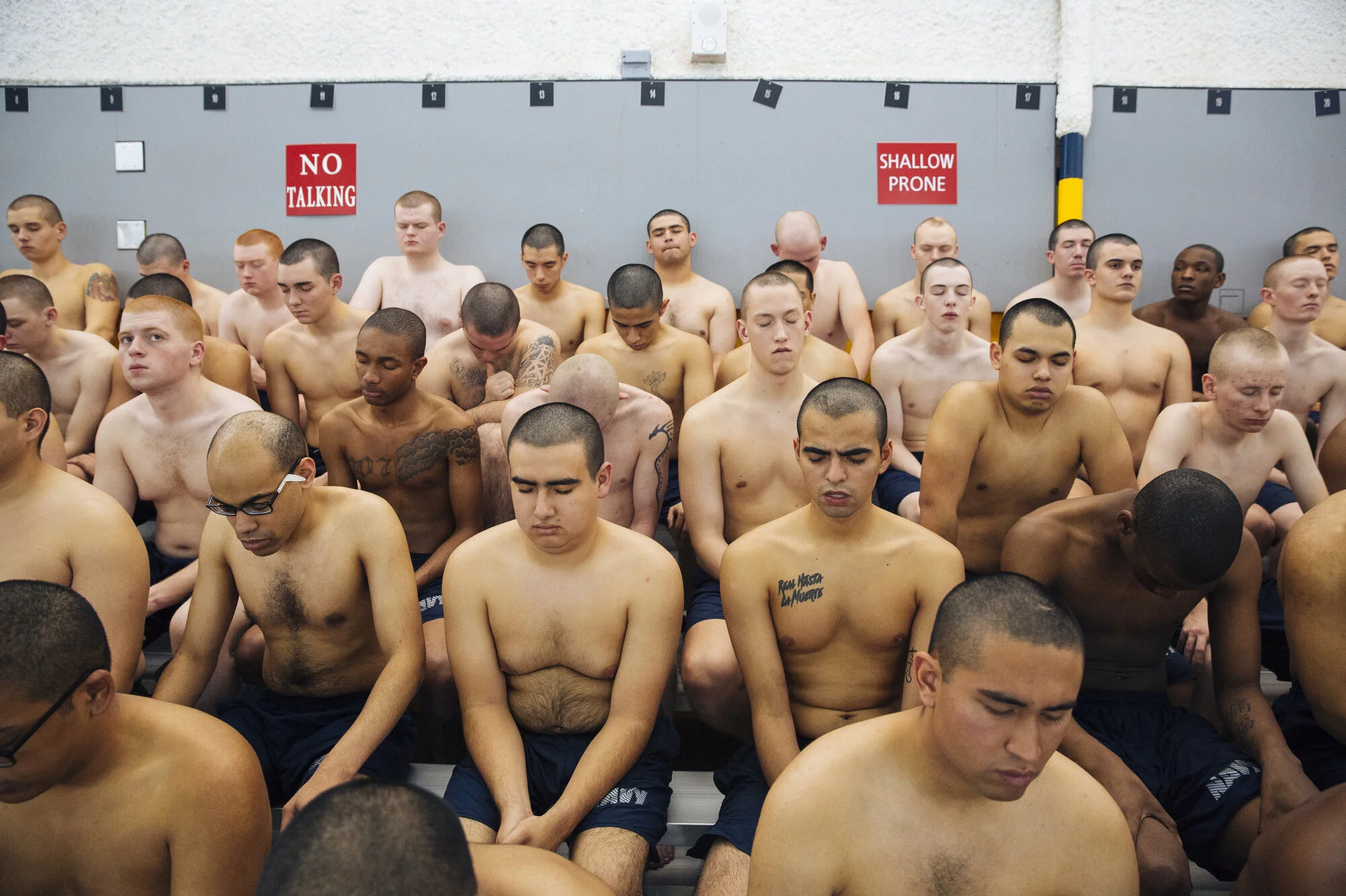  Recruits practice Òwarrior toughnessÓ before swim exercises at Naval Station Great Lakes on Wednesday Feb. 12, 2020 in North Chicago, Ill. ÒWarrior toughnessÓ uses visualization to increase performance and confidence.  CREDIT: Taylor Glascock for Th