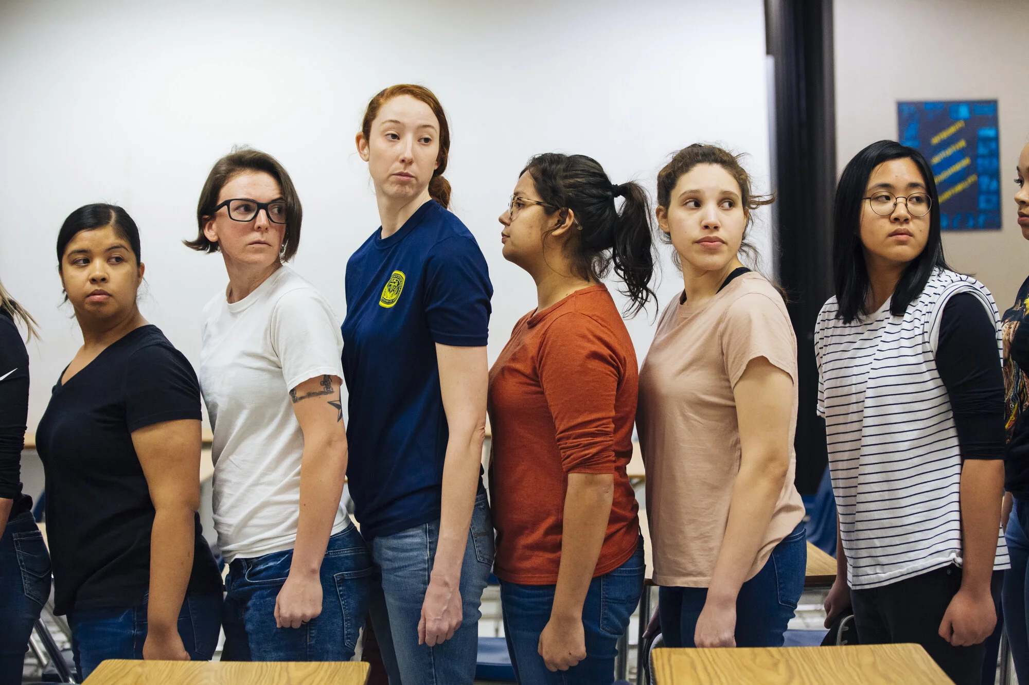  New recruits stand in line heel to toe to get their feet measured for shoes at Naval Station Great Lakes on Wednesday Feb. 12, 2020 in North Chicago, Ill.CREDIT: Taylor Glascock for The Wall Street JournalCSBOOTCAMP 