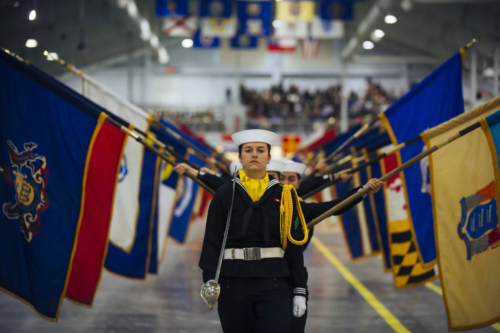  The color guard carries flags from all 50 states during graduation at Naval Station Great Lakes on Friday Feb. 14, 2020 in North Chicago, Ill.CREDIT: Taylor Glascock for The Wall Street JournalCSBOOTCAMP 