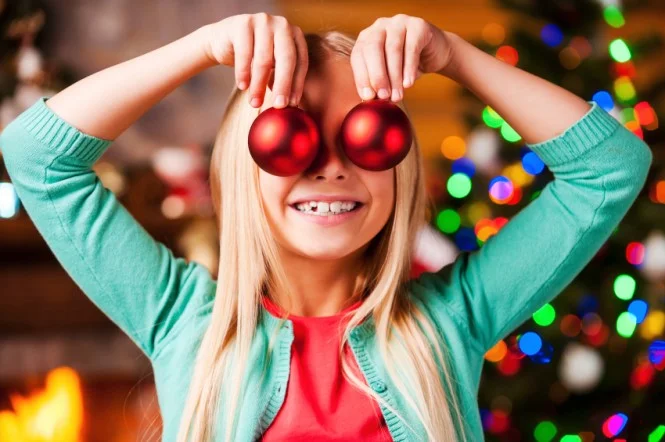 little-girl-with-ornaments-eye-to-eye-derby.jpg