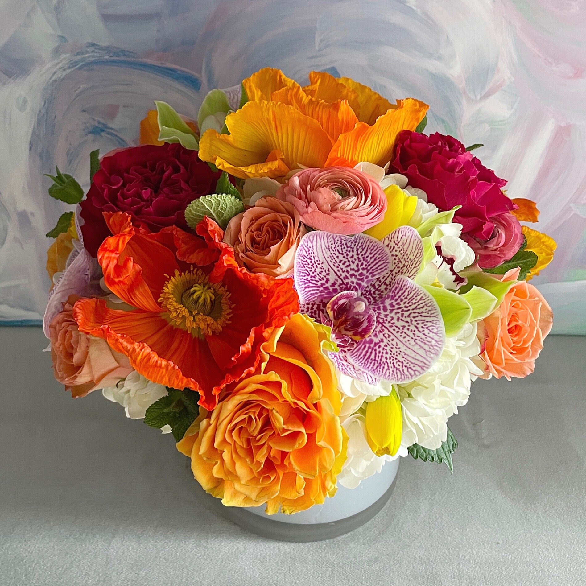  Hot colors, orange, pink, round, orchids, roses. 
