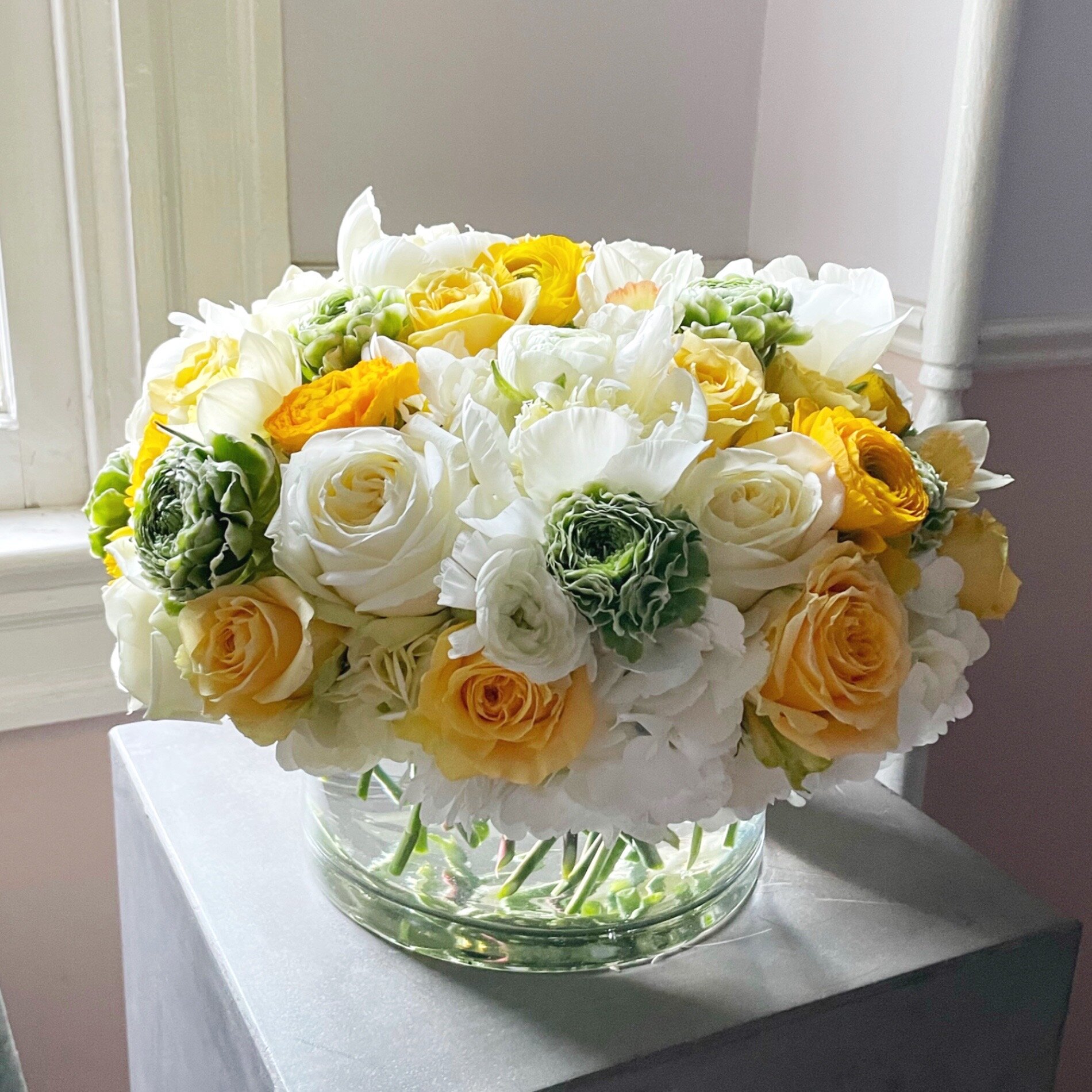  Yellow, green, and white. Large centerpiece, round, tight, modern. 