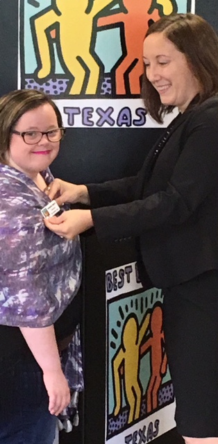 Annmarie receiving her International Best Buddies Ambassador pin