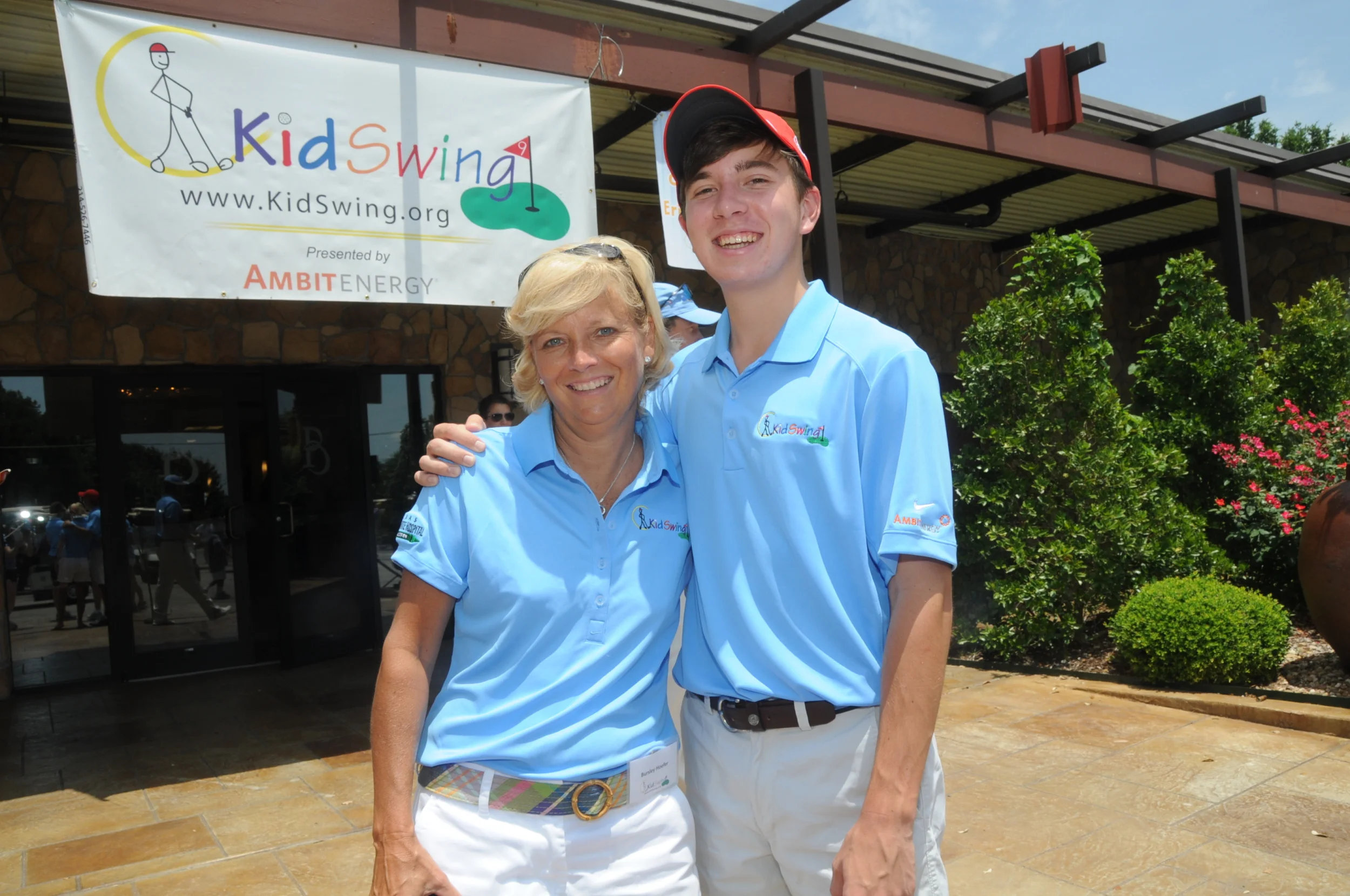 Bursley and Stephen Hoefer at a KidSwing event in 2013.