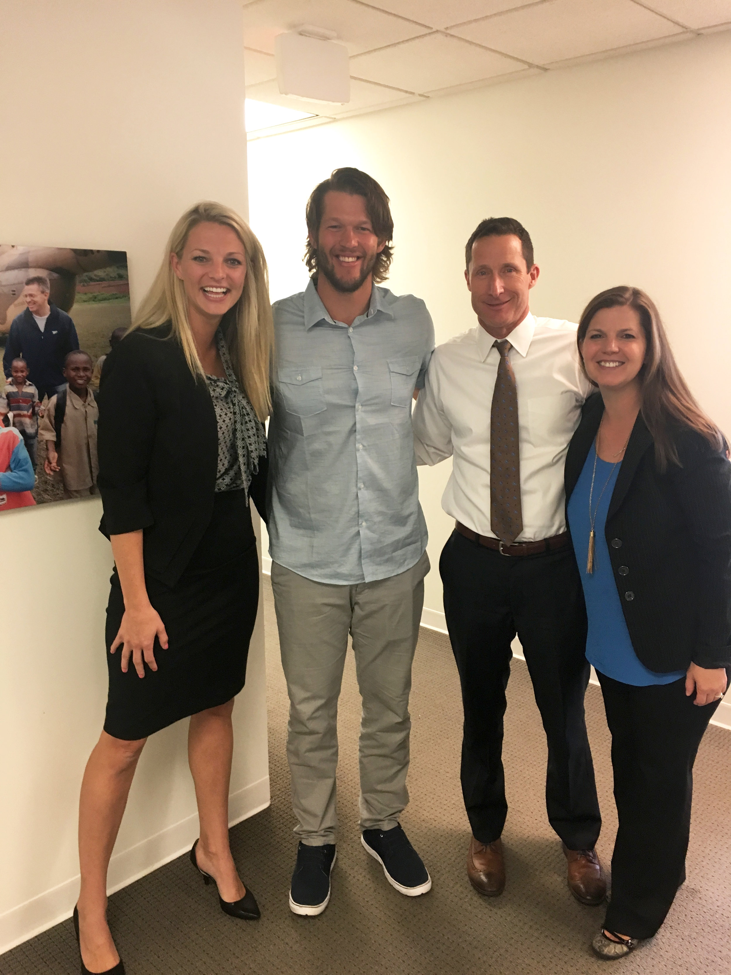 Clayton Kershaw pictured with Mallory, Sean Litton (IJM President) and Jaclyn Willert (Dir of Professional Athlete Partners and Programs) when he visited IJM’s headquarters in 2017.