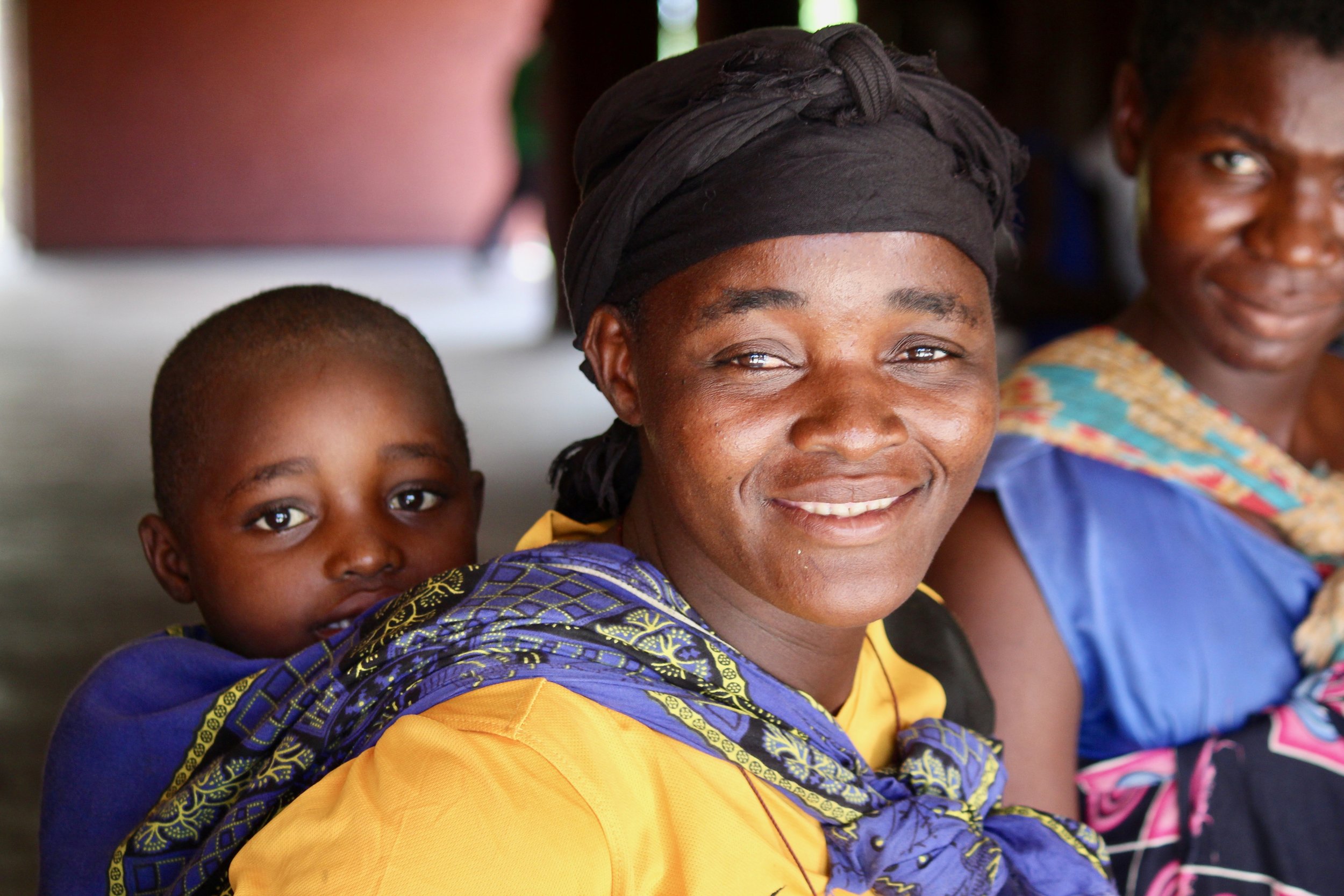 A mother and baby visit a clinic in Malawi. | Photo courtesy of Global Health Innovations.