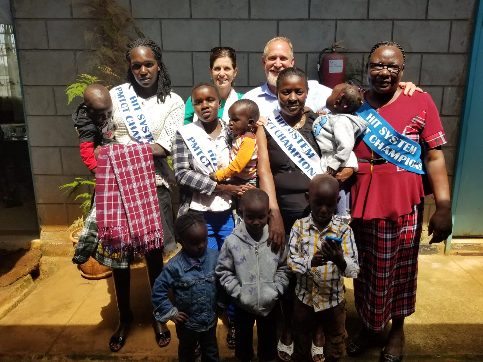 Mothers and babies with Brad Gautney in Kenya. | Photo courtesy of Global Health Innovations.