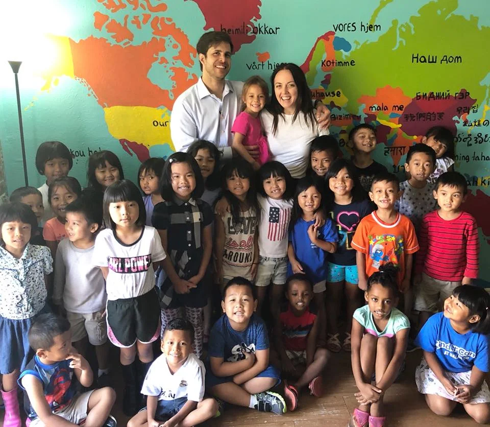 Photo of Lilly Neubauer with her husband, Markus, daughter Heidi, and students from Heart House. Photo courtesy of Lilly Neubauer.