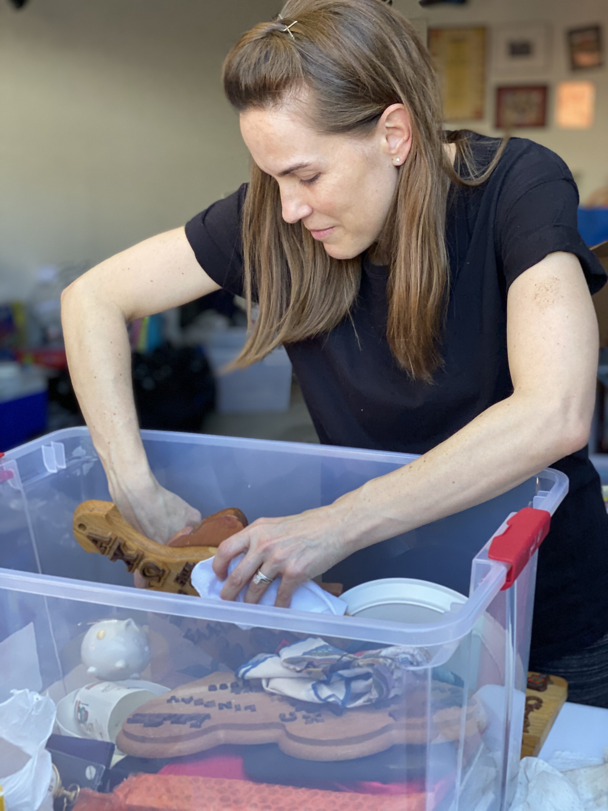  Elizabeth spent hours sorting though personal items that were salvaged from their North Haven home. She was able to save her cap and gown from her Texas Tech graduation. 