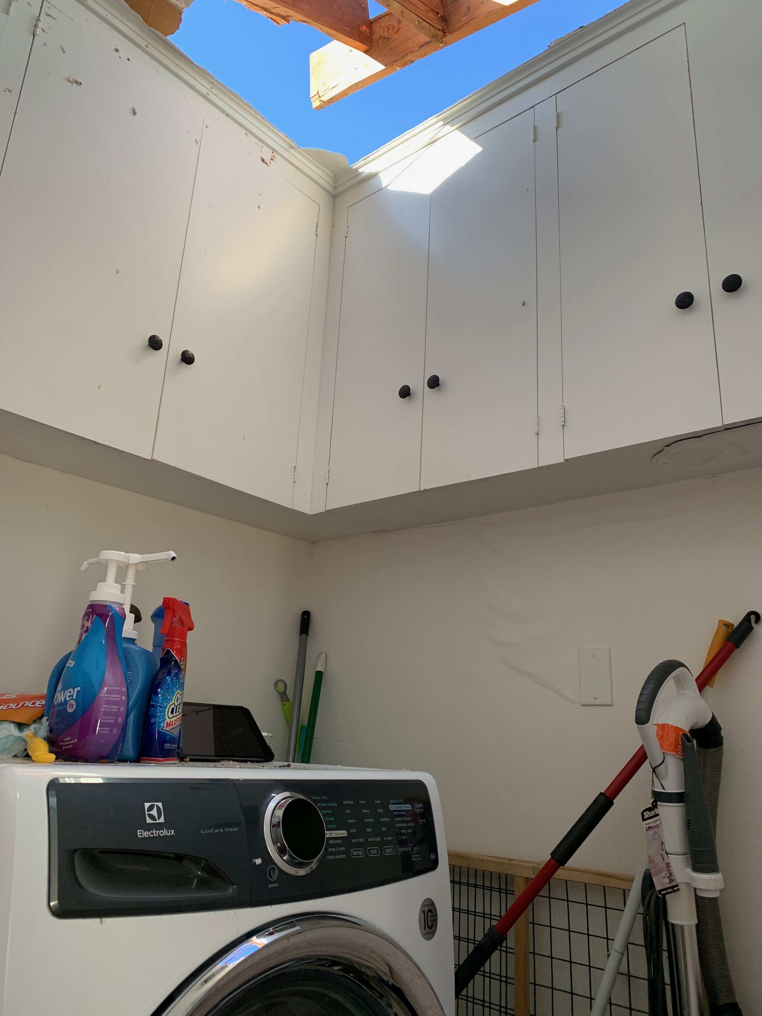  While taking cover in the laundry room, the EF3 tornado blew the roof off of the family's house.    