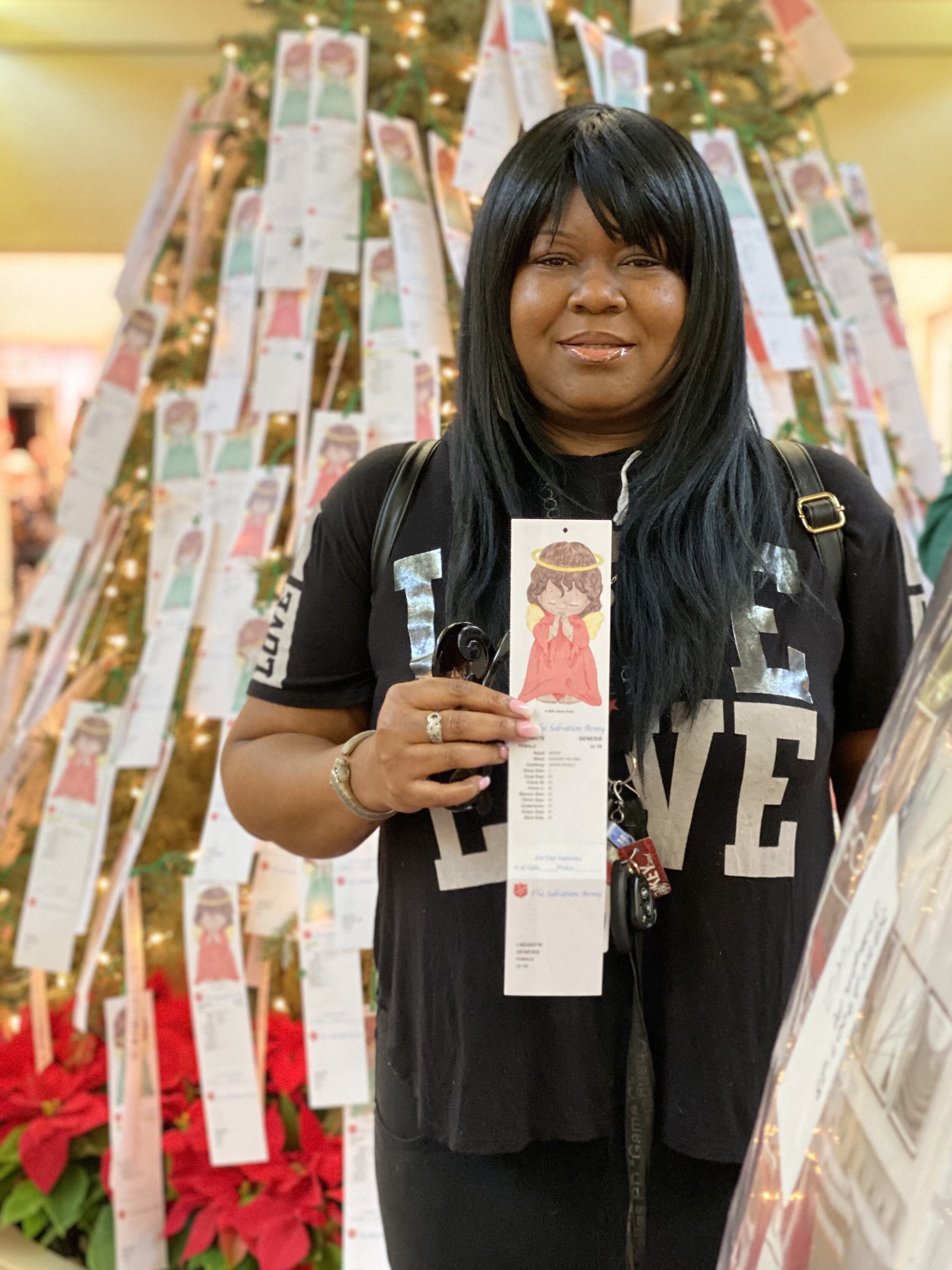  Christening Webb stopped by the Angel Tree four times to adopt kids.  Being a former recipient of the Salvation Army Angel Tree, Christening believes in paying it forward and giving back to the organizations that so generously supported her as a chi