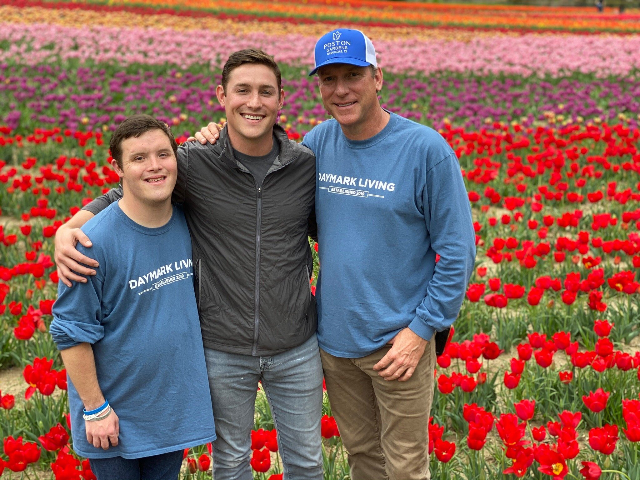 John Poston with sons Michael and Blake.