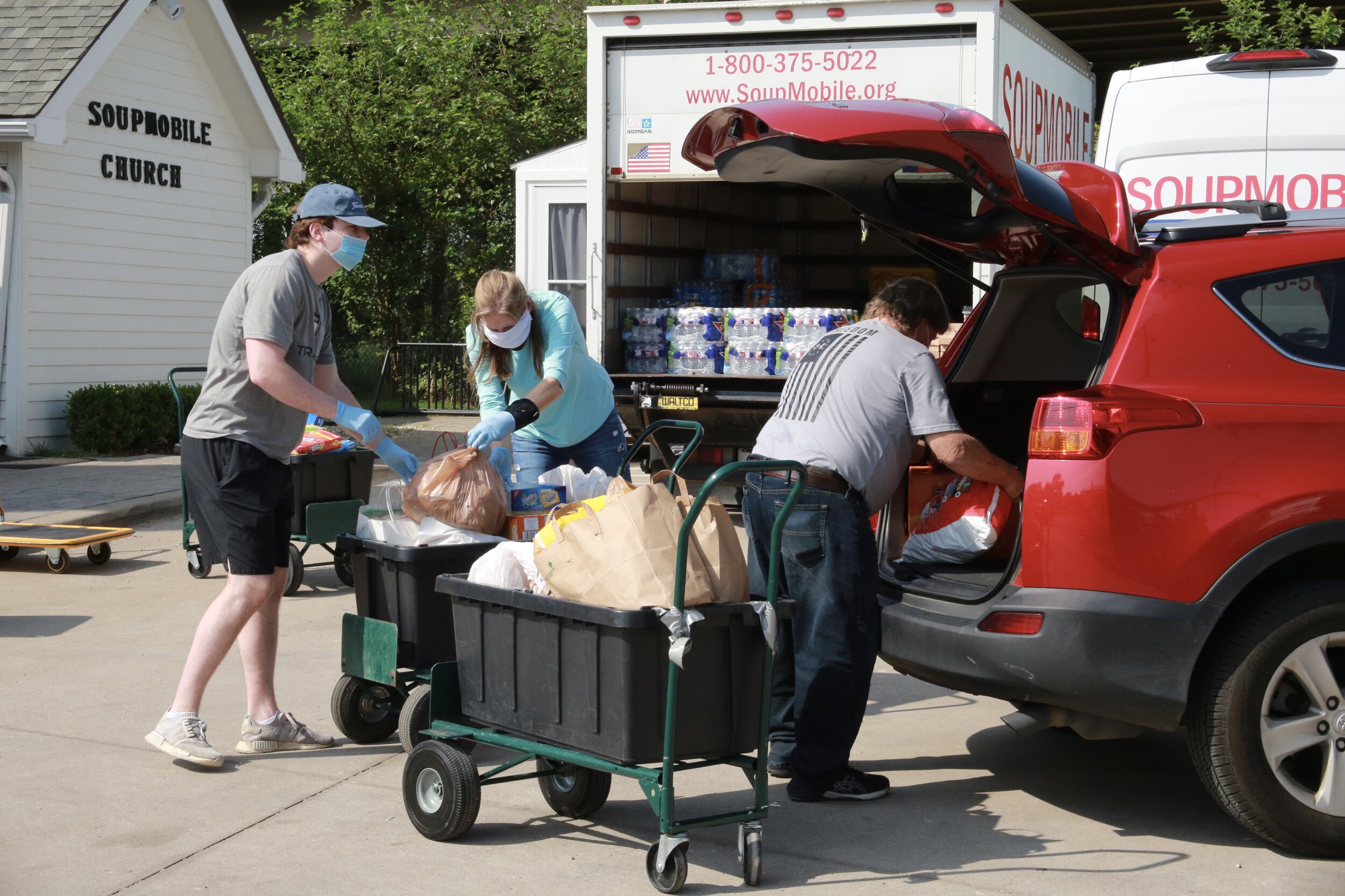 Christie Schmitt and her son, Ryan, delivered the food to The SoupMobile.