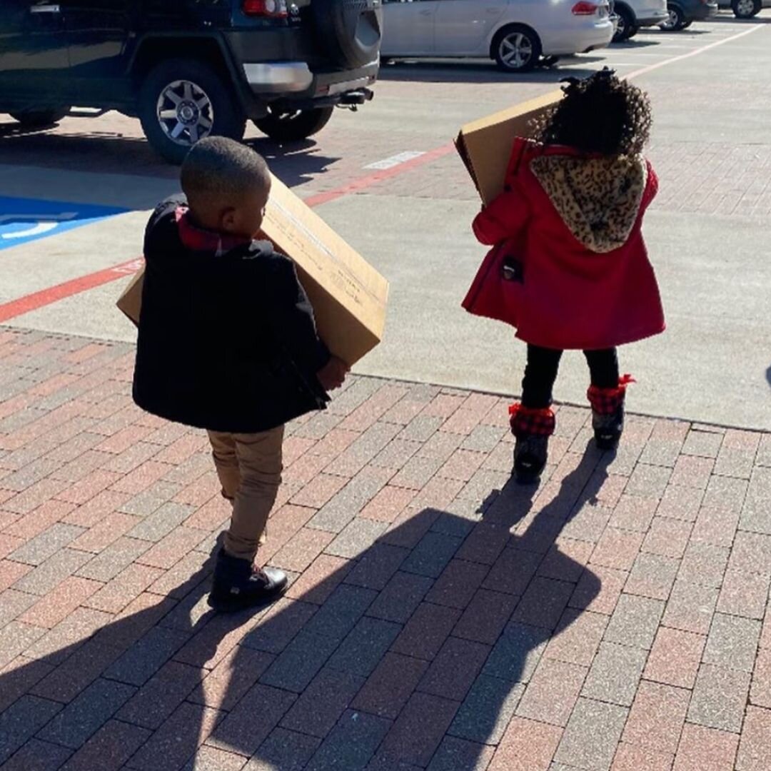 kids carrying boxes.jpg