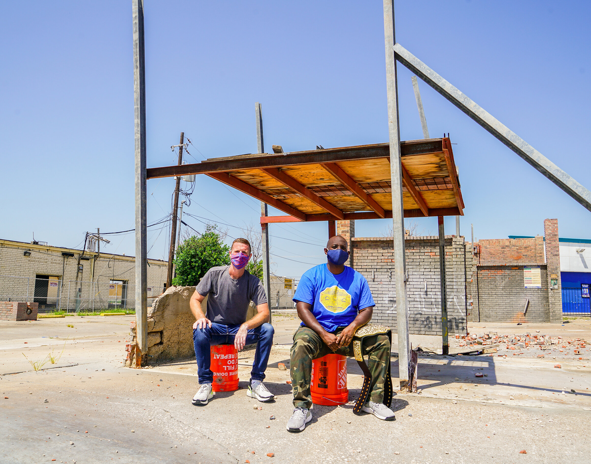 (L to R) Jordan with Eric at a local car wash destroyed by an EF3 tornado in October 2019, just blocks from Burnet Elementary.