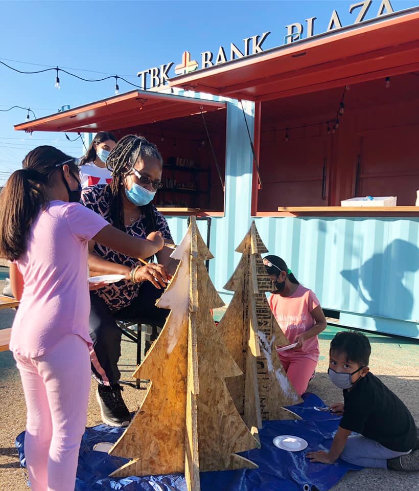 Children participate in an outdoor art event hosted by Junior Players and Better Block. (Photo courtesy of Junior Players.)