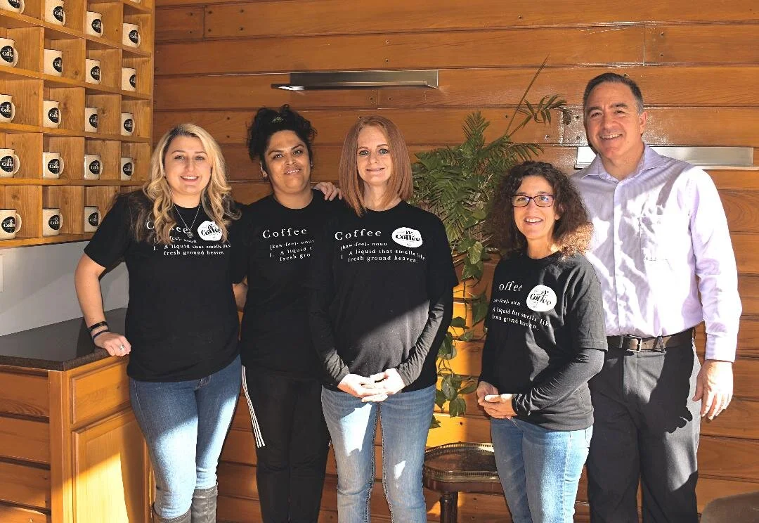 The first three employees at Well Grounded Coffee with co-owners Natalie and Michael Huscheck. (Photo courtesy of Well Grounded Coffee Community.)